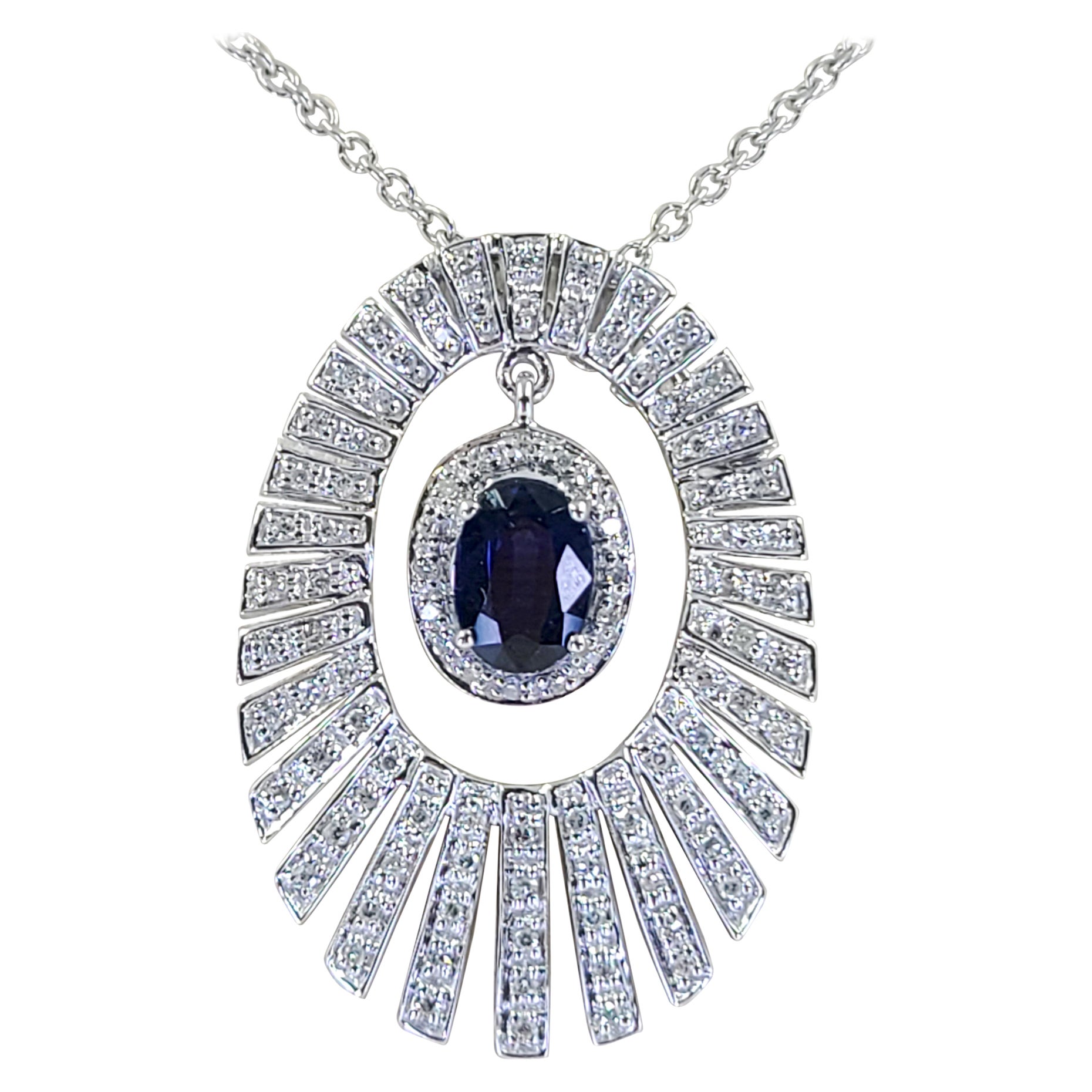 White Gold, Diamond, and Sapphire Starburst Pendant Necklace For Sale