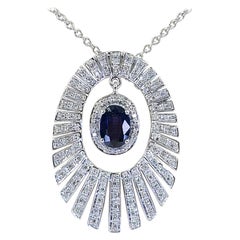 White Gold, Diamond, and Sapphire Starburst Pendant Necklace