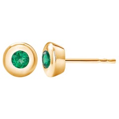 14 Karat Yellow Gold Bezel Set Emerald Stud Earrings Weighing 0.30 Carat