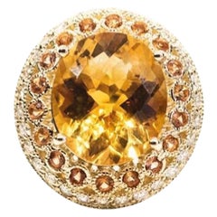 10 Carat Mandarin Orange Citrine Surrounded by Orange Sapphires and Diamonds