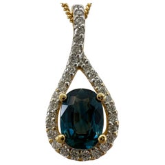 1.23 Carat Deep Blue Sapphire & Diamond Crossover 18k Gold Oval Pendant Necklace