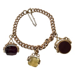 Superbe bracelet ancien en or jaune 9 carats avec pendentif en forme de sceau à 3 boutons