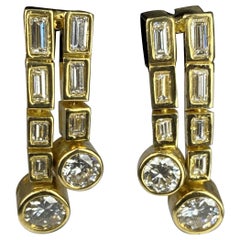  Boucles d'oreilles en or 18 carats en diamants baguettes et diamants ronds