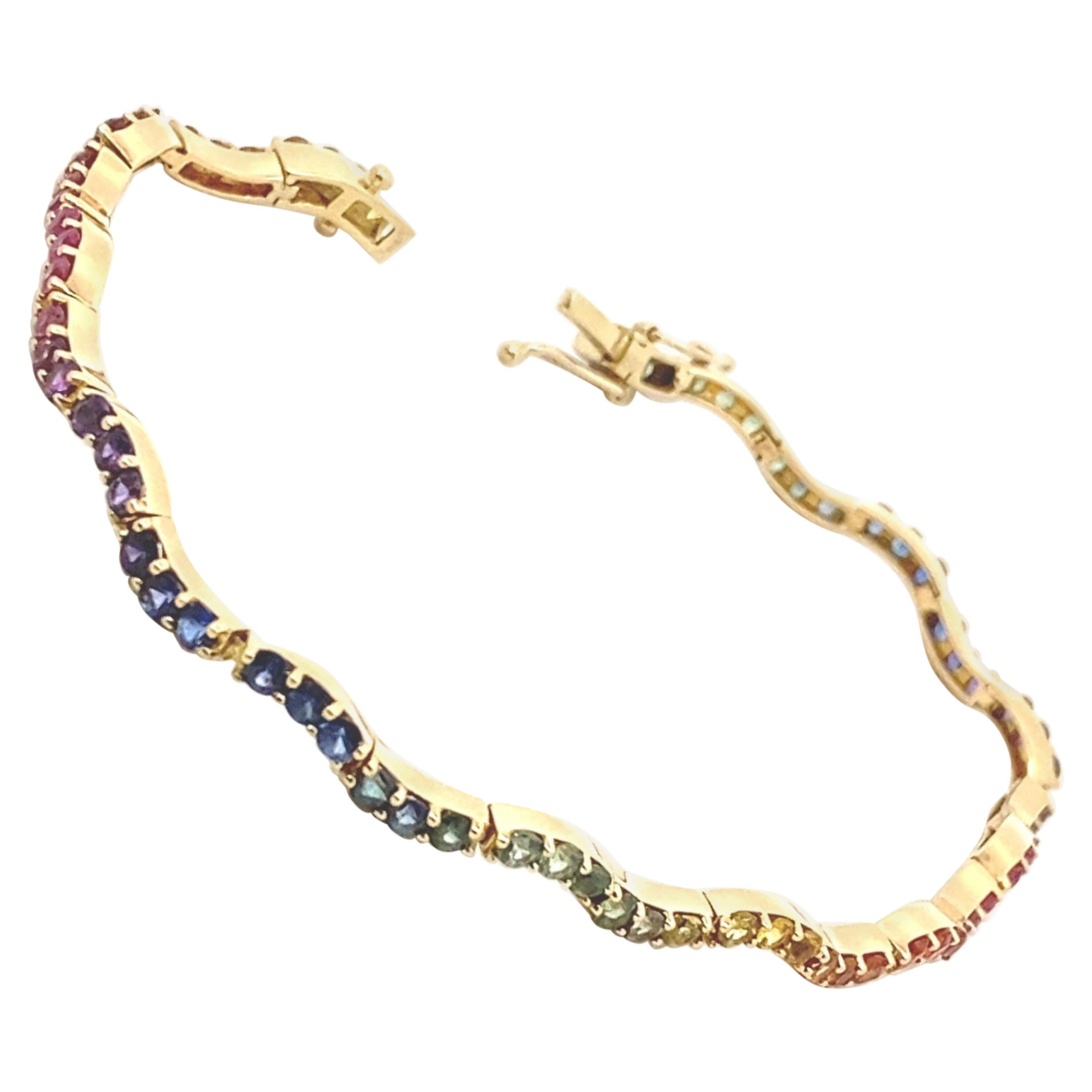 Rainbow Sapphire Yellow Gold Wavy Tennis Bracelet For Sale