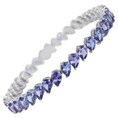 $1 NO RESERVE!  13.76cttw Natural Pear Tanzanite, 14k White Gold Bracelet