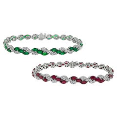 Lot de deux bracelets en diamant de 7,50 ct. et en émeraude de 4,00 ct. et en rubis de 5,00 ct.