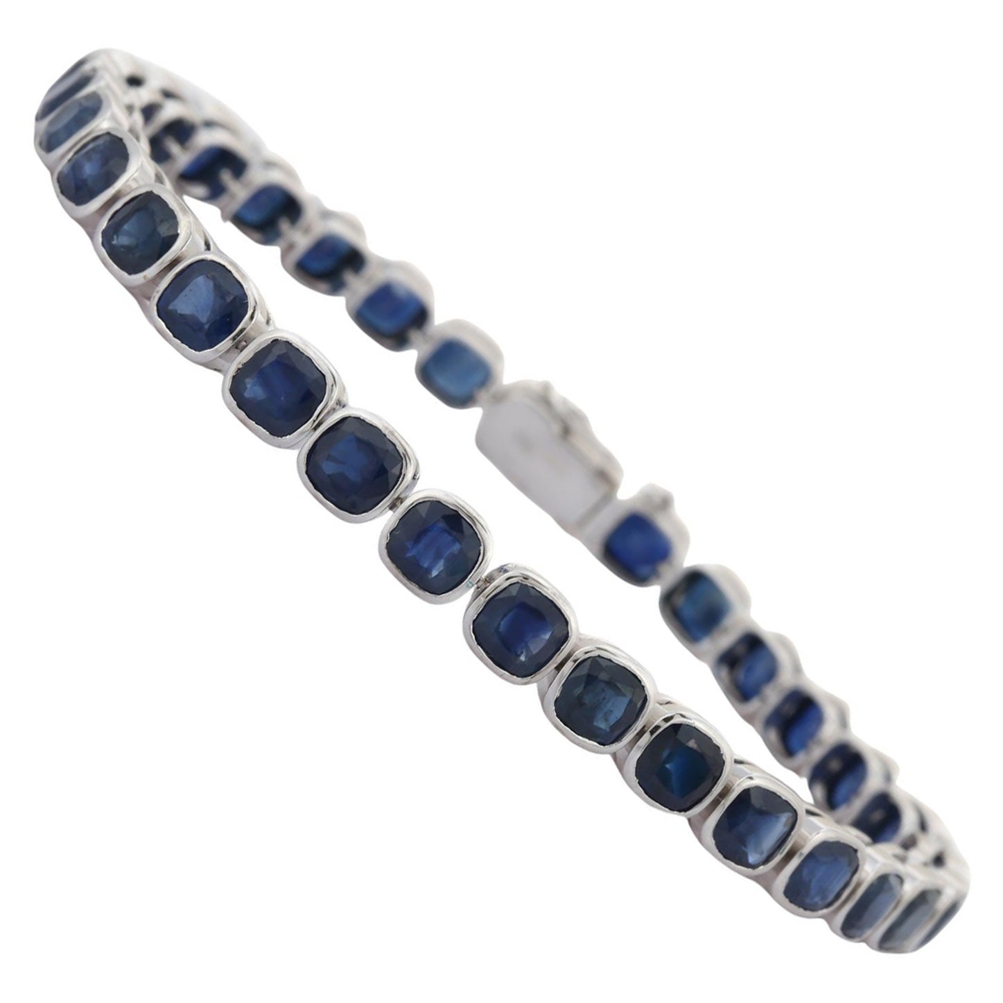 18 Karat White Gold 19.15 Carat Dark Blue Sapphire Tennis Bracelet For Sale