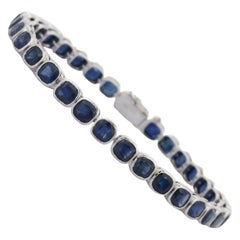 18 Karat White Gold 19.15 Carat Dark Blue Sapphire Tennis Bracelet