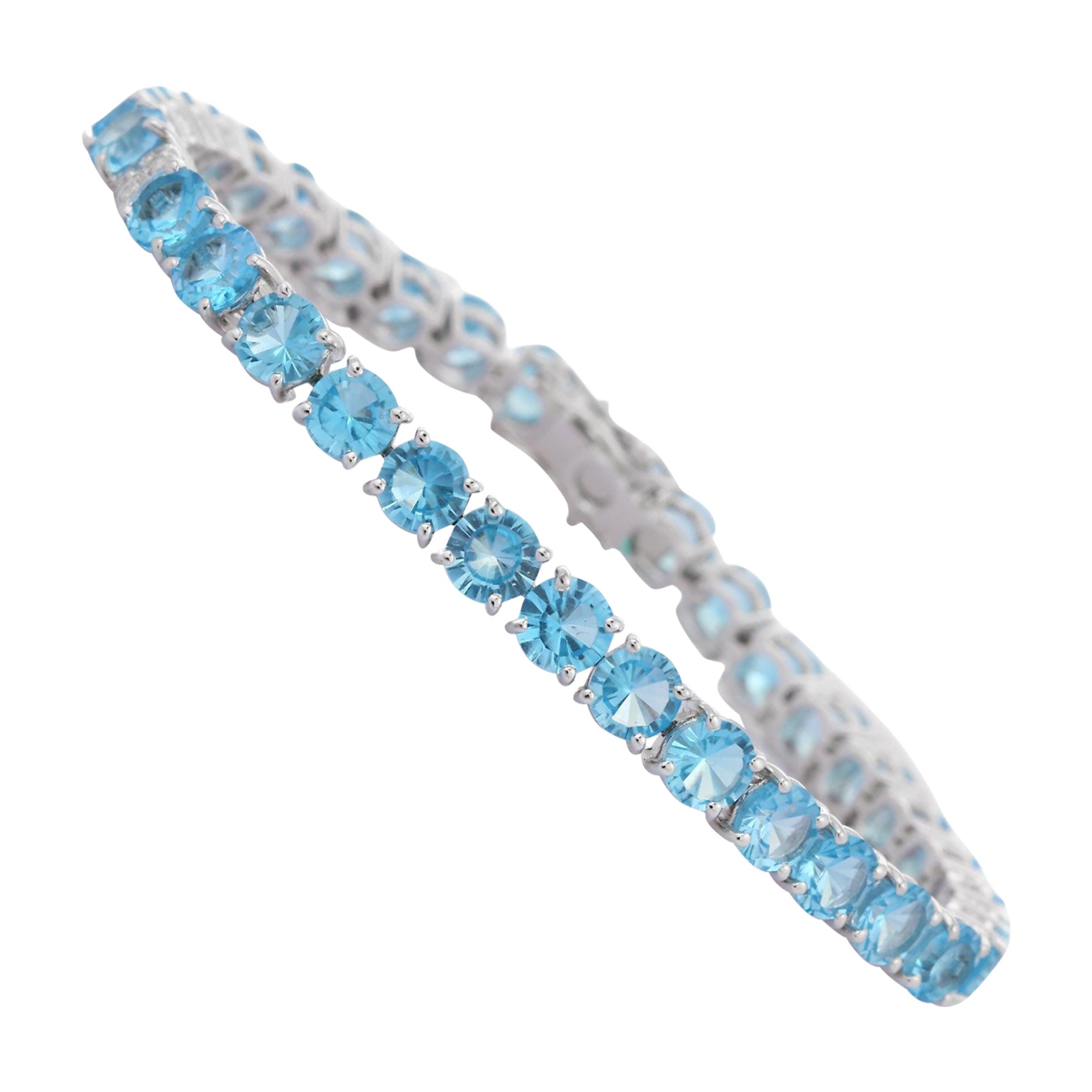 Bracelet tennis en or blanc massif 18 carats avec topaze bleue scintillante et diamants