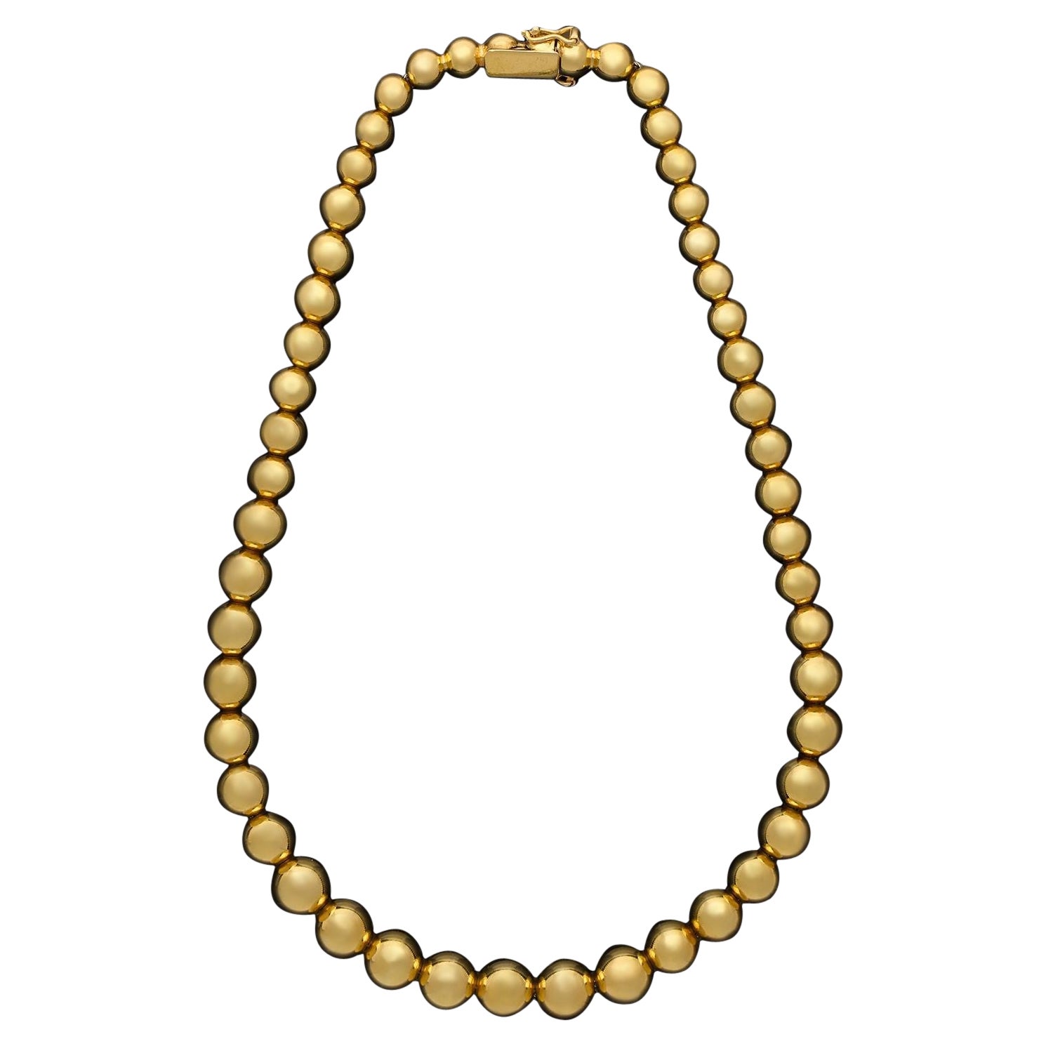Tiffany & Co. an 18ct Gold Graduated Bead Necklace, circa 1980s For Sale