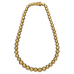 Tiffany & Co. an 18ct Gold Graduated Bead Necklace, circa 1980s