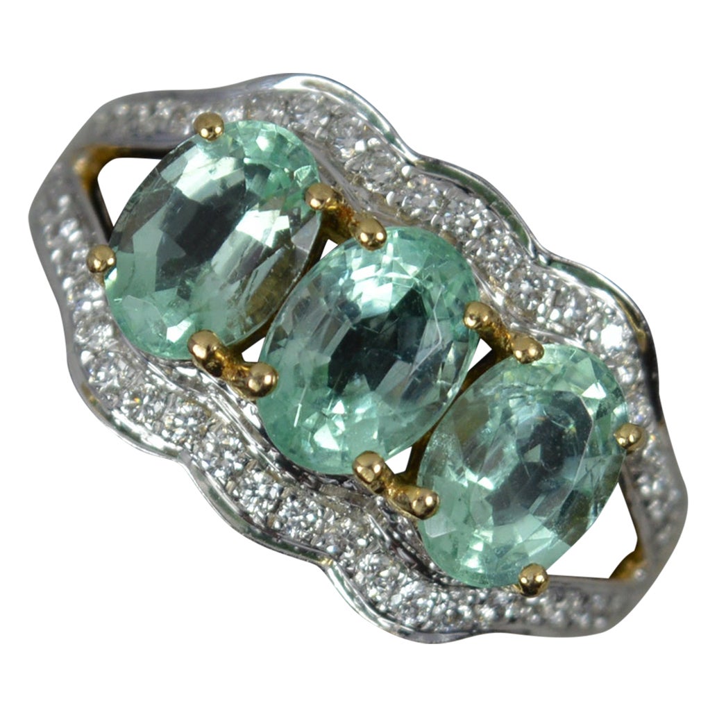 Lorique Natural Paraiba Tourmaline and Diamond 18ct Gold Trilogy Cluster Ring