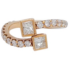 Bague bypass en or rose 18 carats avec diamants blancs taille princesse et ronds