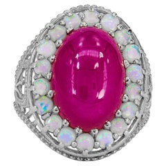Massiver Ring mit Rubinen und Opalen
