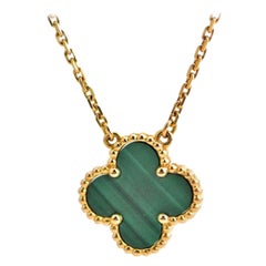 Van Cleef & Arpels Pendentif vintage Alhambra en or jaune 18 carats et malachite