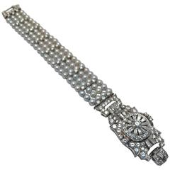 Ladies Platinum Diamond Pearl Bracelet Wristwatch