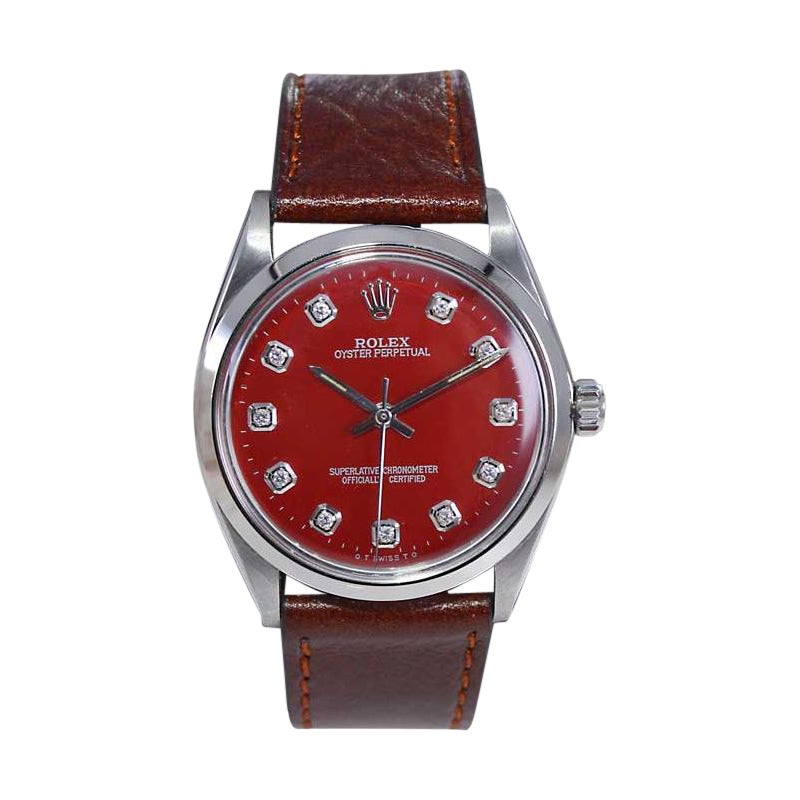 Rolex en acier inoxydable avec cadran à diamants rouges fait sur mesure dans les années 1960/70 en vente