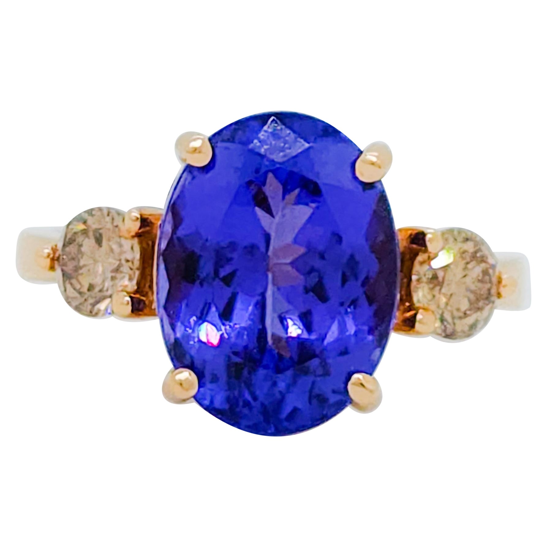 Tanzanite Oval and Champagne Diamond Three Stone Ring in 14k Rose Gold For Sale