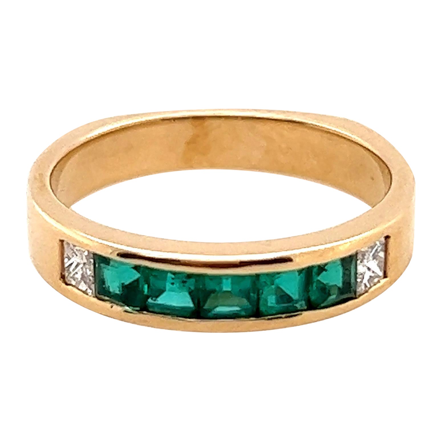 Retro Gold 1.3 Carat Natural Green Emerald and Colorless Diamond Band Circa 1980 For Sale