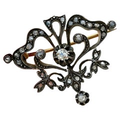 Antique Diamond Bow Brooch in Gold