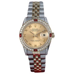 Rolex 31mm Datejust Champagnerfarbene Uhr mit römischem Zifferblatt, Diamant-Lünette und Gepäckstücken