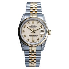Rolex Datejust Bisel Acanalado Tapones de Diamante Esfera Crema Dos Tonos Reloj de Mujer