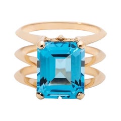 5.8 Carat Emerald Cut Blue Topaz Yellow Gold Triple Band Ring 