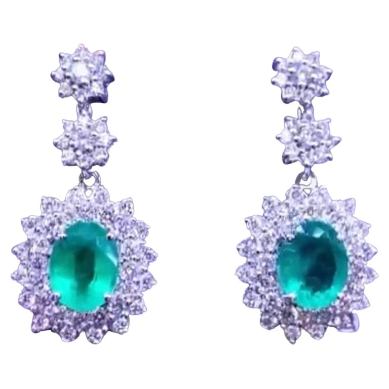 Amazing 8.53 Carats of Emeralds and Diamonds on Earrings For Sale