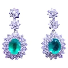 Amazing 8.53 Carats of Emeralds and Diamonds on Earrings