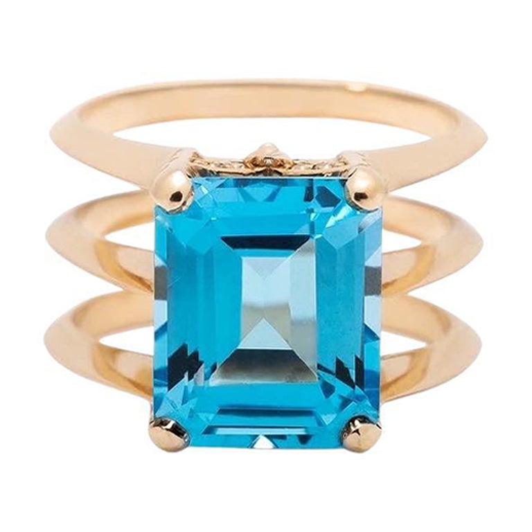 5.8 Carat Emerald Cut Blue Topaz Yellow Gold Triple Band Ring  For Sale