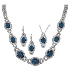 13.00 Carat Diamond 22.00 Carat Blue Topaz Necklace Earrings and Pendant Set