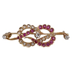Broche victorienne en or 14 carats avec rubis de 0,80 carat et diamants de 0,55 carat