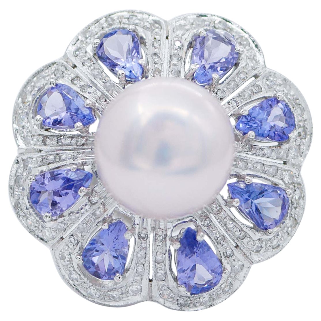 Anillo de perla rosa, tanzanita, diamantes, platino y oro blanco de 14 quilates en venta