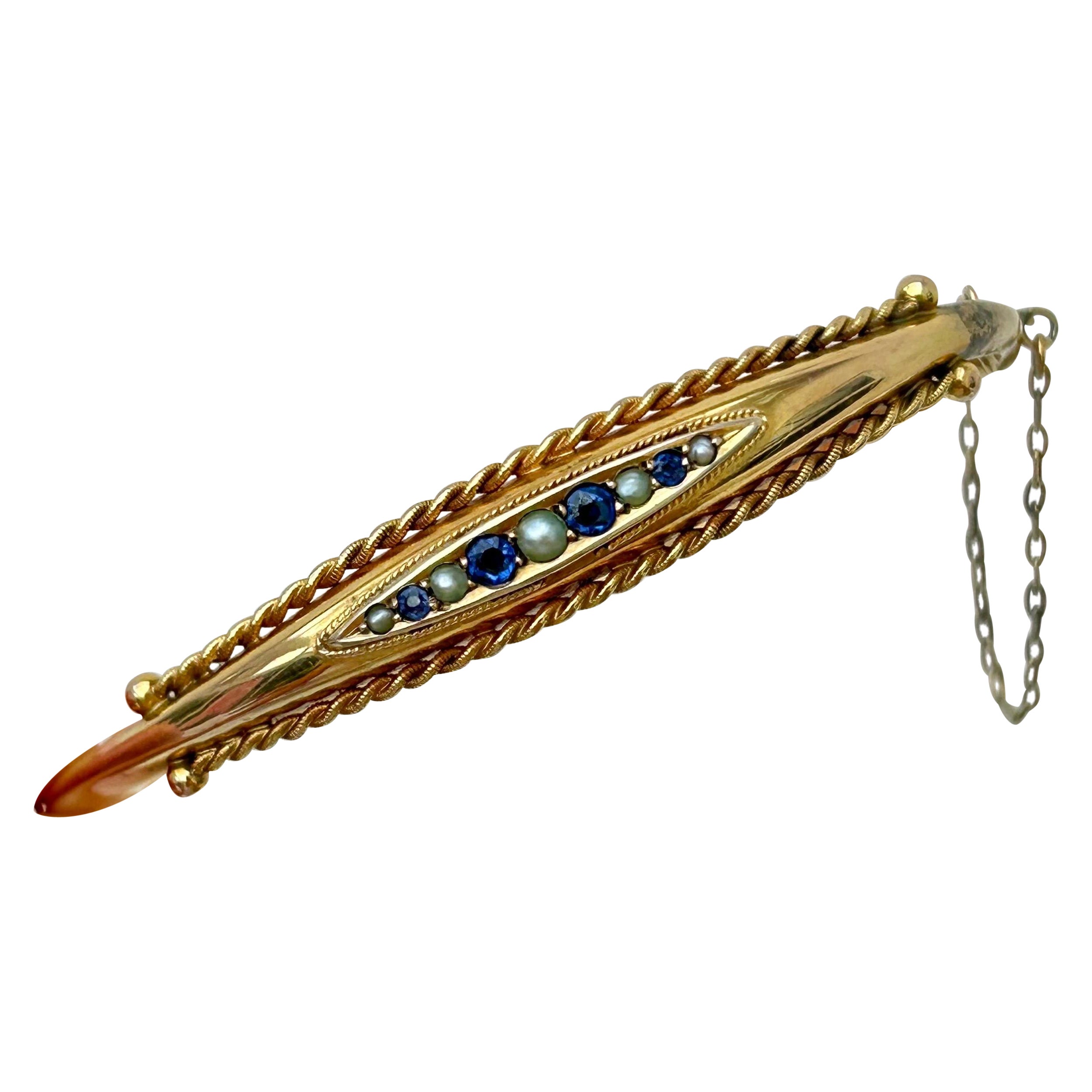 Antique C.1898 Sapphire and Pearl Bangle Bracelet in 9 Carat Yellow Gold For Sale