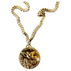 Collier pendentif médaille opale aigue-marine colombe plaqué or