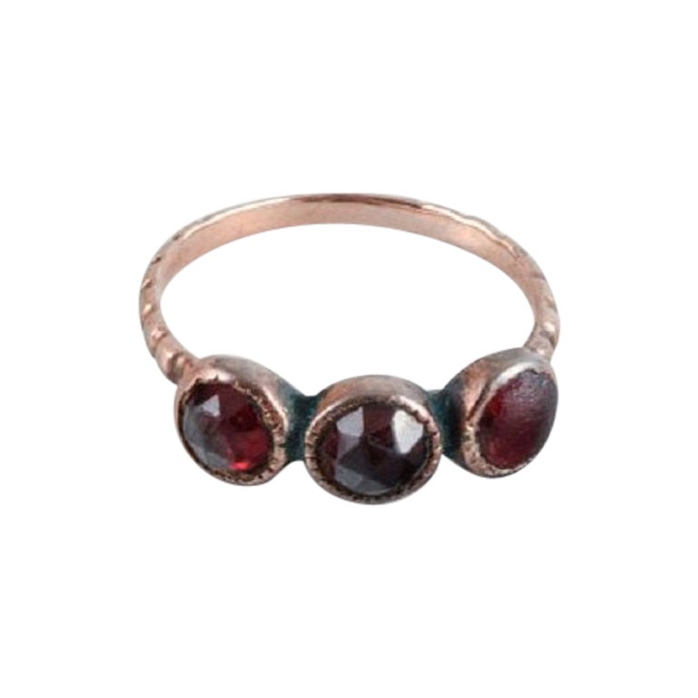 Scandinavian Goldsmith, Gold Ring Adorned with Three Red Stones, 1920s-1930s For Sale