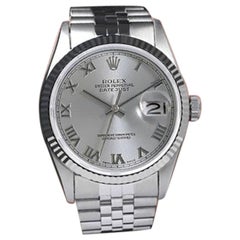 Rolex Montre Datejust avec cadran romain en argent et lunette cannelée en acier inoxydable, 36 mm