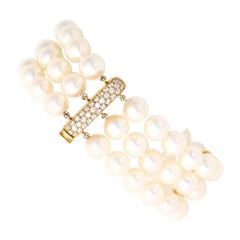 Bracelet vintage à trois brins en or jaune 18 carats avec perles et diamants