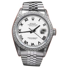 Rolex Montre datejust en acier avec cadran romain blanc 36 mm et lunette en diamants