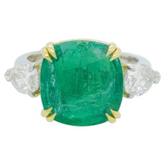 Emerald Cushion and White Diamond Pear Shape Three Stone Ring