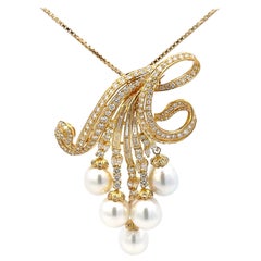 Grand collier de diamants et de perles en or jaune 18 carats