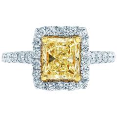 1.53 Carat EGL Certified Radiant Cut Fancy Yellow Diamond Halo Engagement Ring