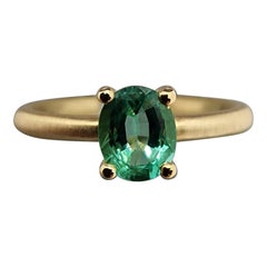 Satinated 18 Karat Yellow Gold Ring with Emerald