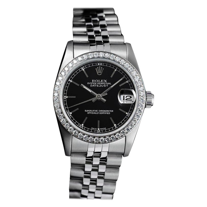 Montre Rolex Datejust à lunette en diamant et cadran noir en acier inoxydable en vente