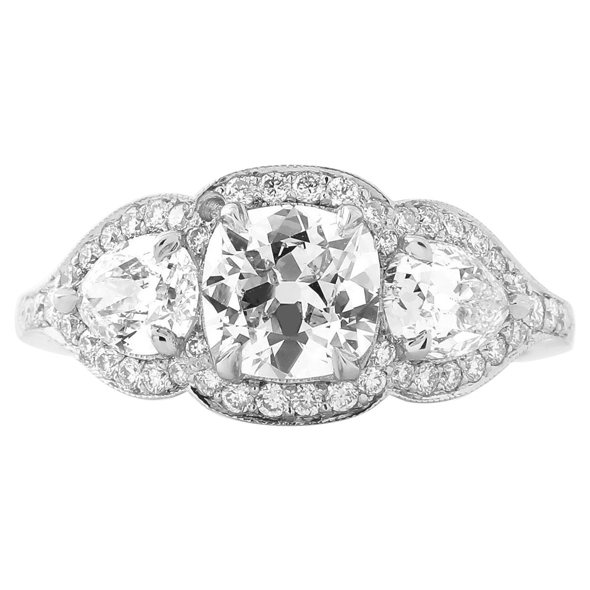 GIA Certified Antique-Cut Diamond Cushion & Pear Shape Three Stone Ring For Sale