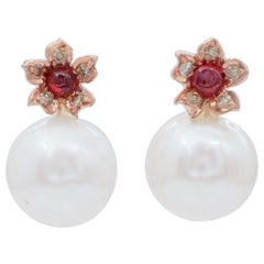 Rose gold earrings with diamonds, rubies and pearls