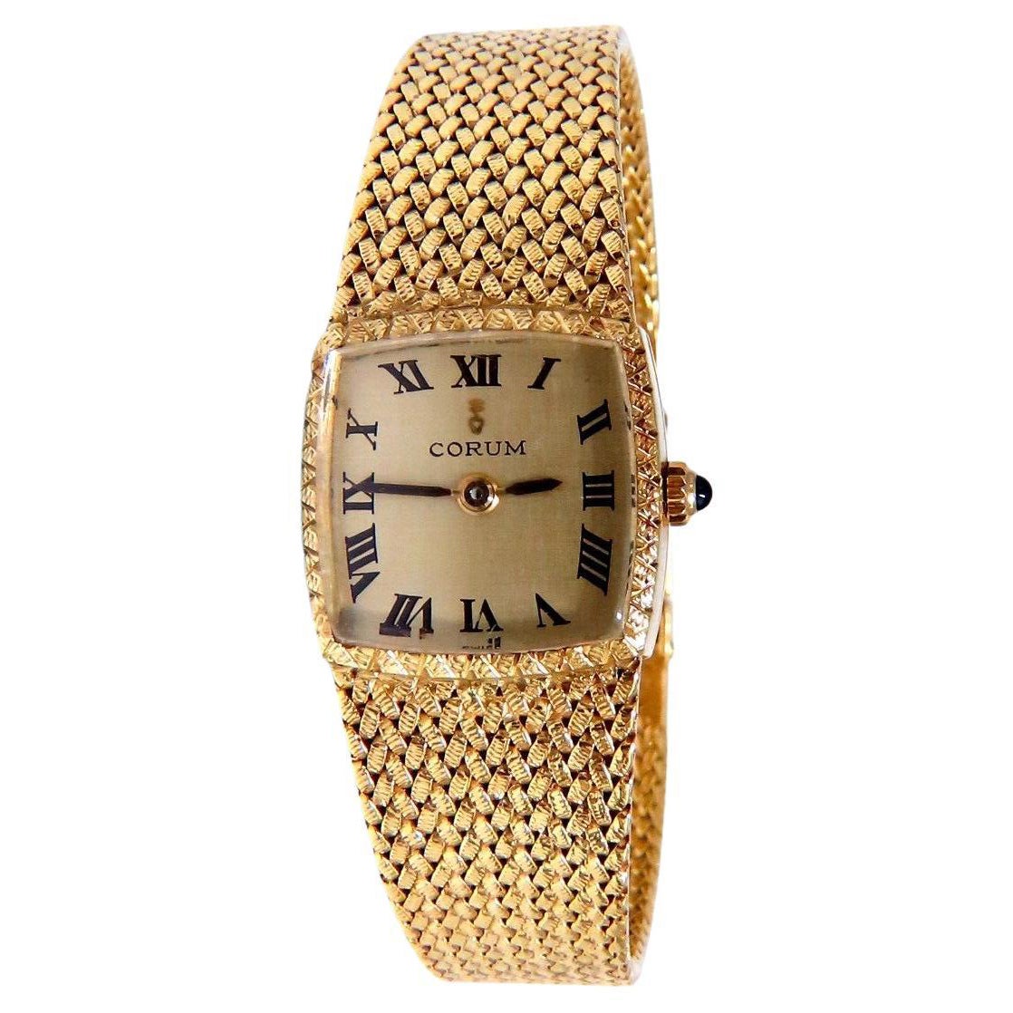 Montre vintage Corum en or 18 carats