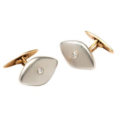 Paire de boutons de manchette en platine et or avec diamants