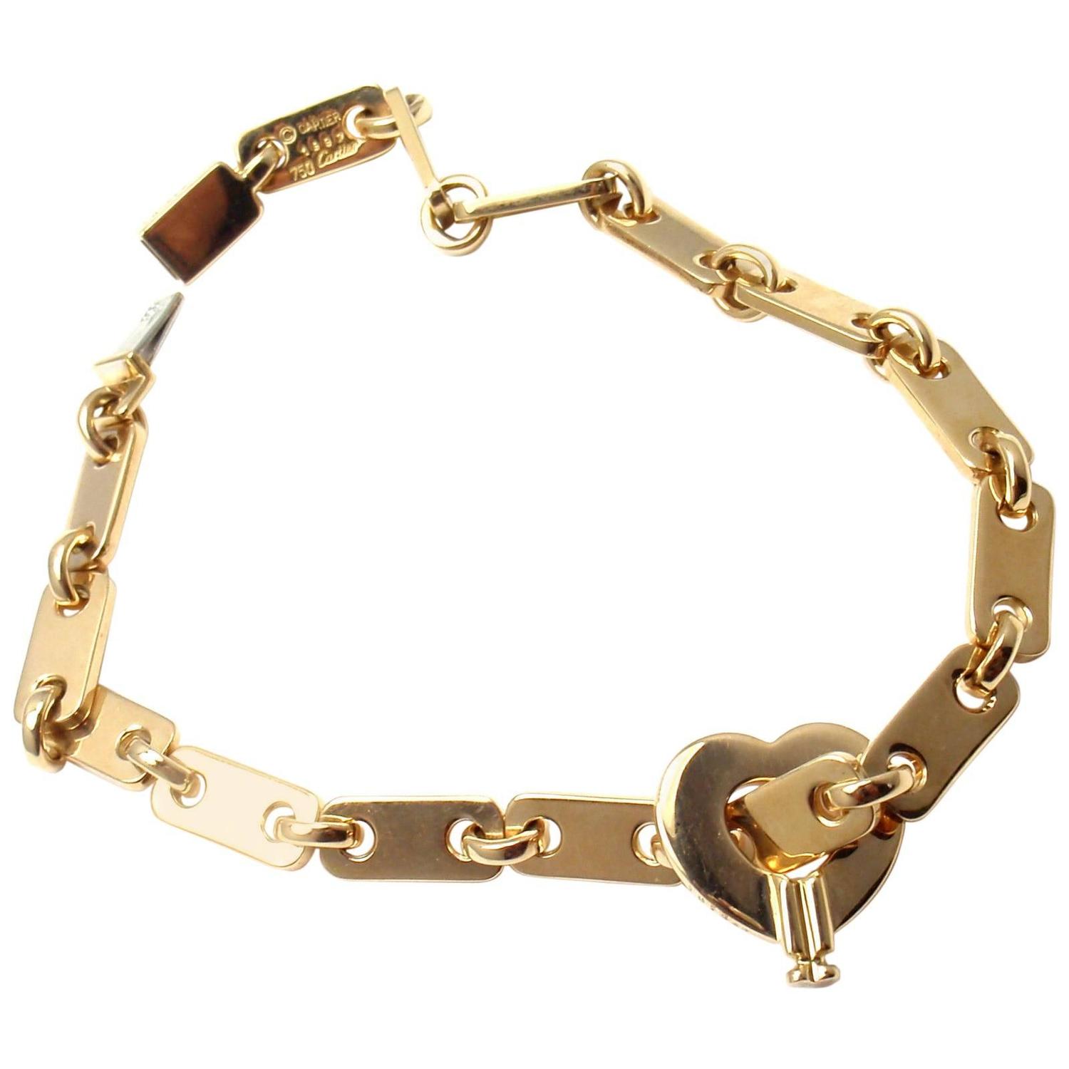 Cartier Gold Heart Lock Charm Link Bracelet at 1stdibs