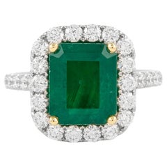 GIA 4.68ctt Emerald and Diamond Halo Ring 18k Gold
